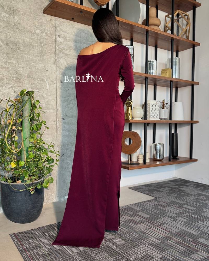 Burgundy dress with a long asymmetrical cape