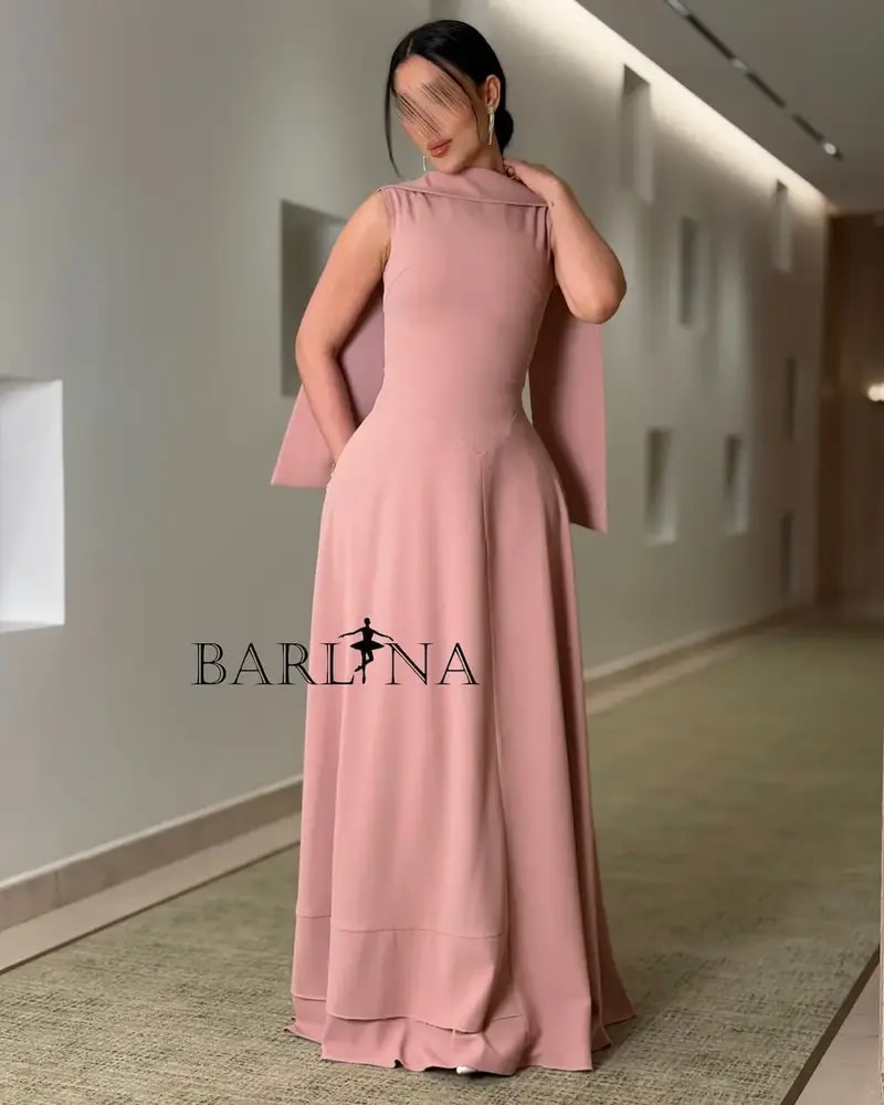 Soft, long pink dress with a simple design