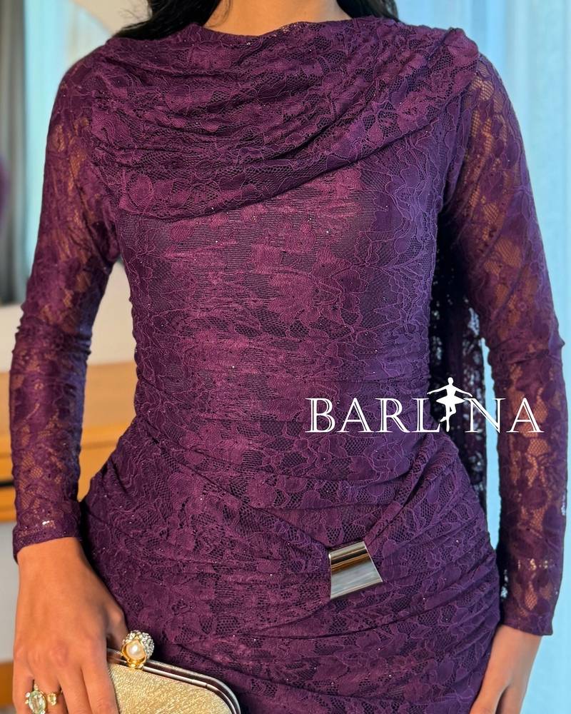 Elegant purple lace dress with a draped shawl