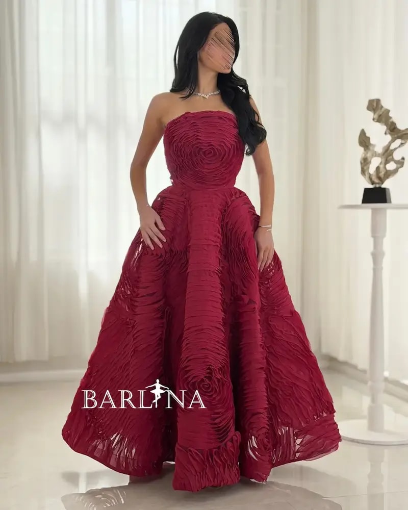 Red evening dress with 3D details