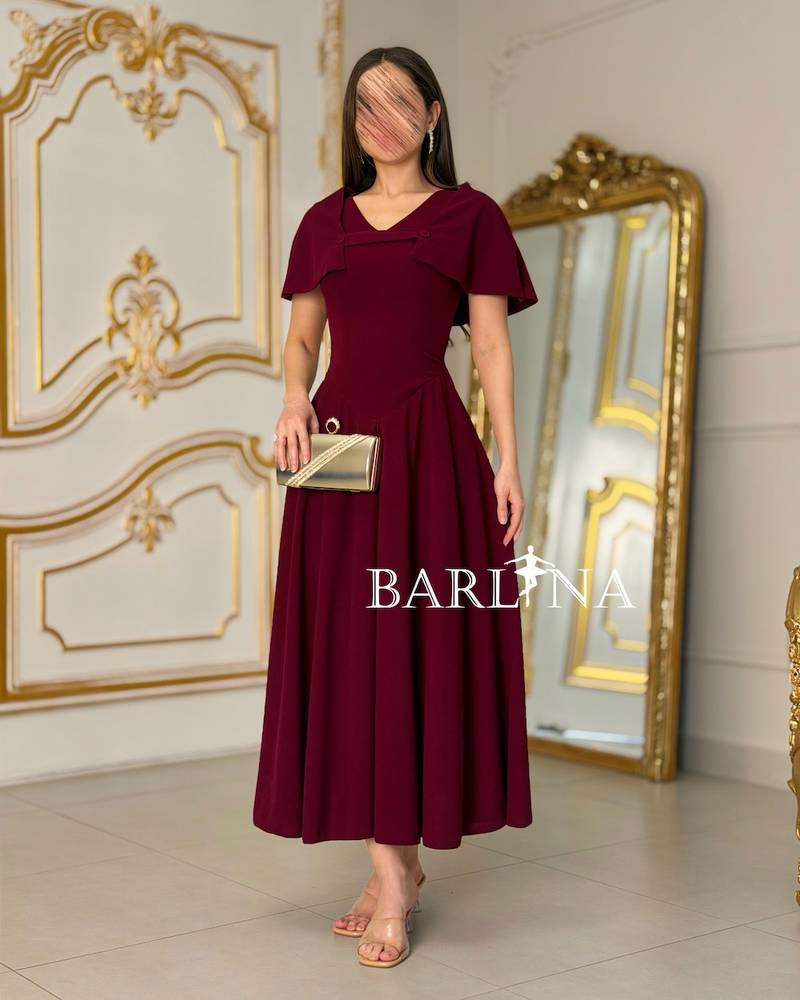 Elegant burgundy dress with a top