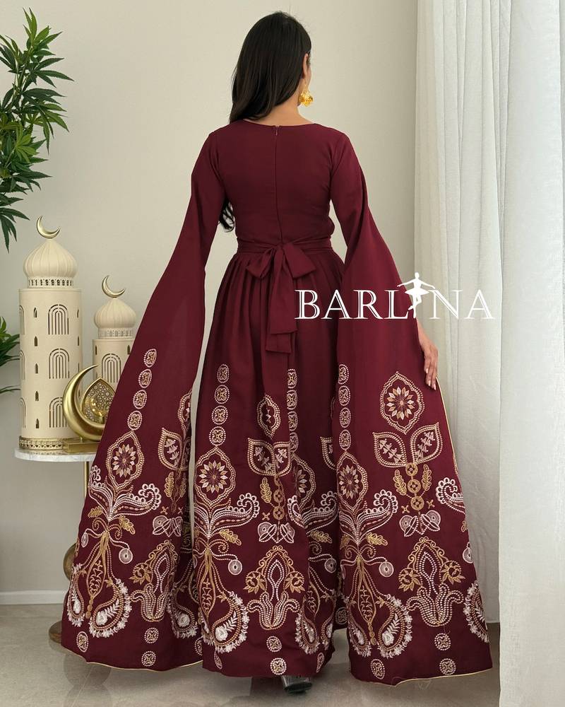 Maroon jalabiya with oriental embroidery and flowing sleeves
