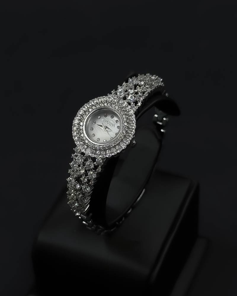Women's watch with a round design and crystal embellishments