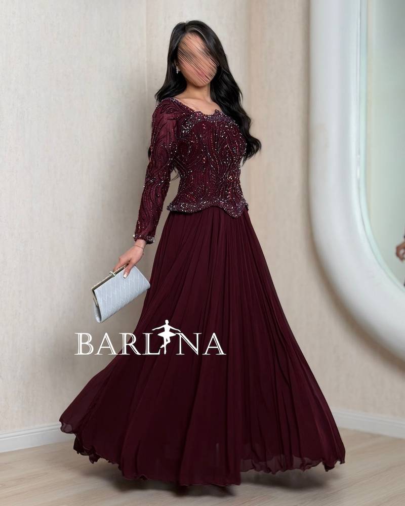 Maroon wide evening dress with luxurious embroidery