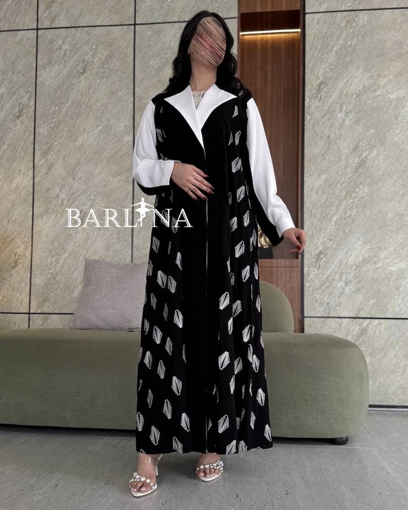 Elegant black abaya with white details