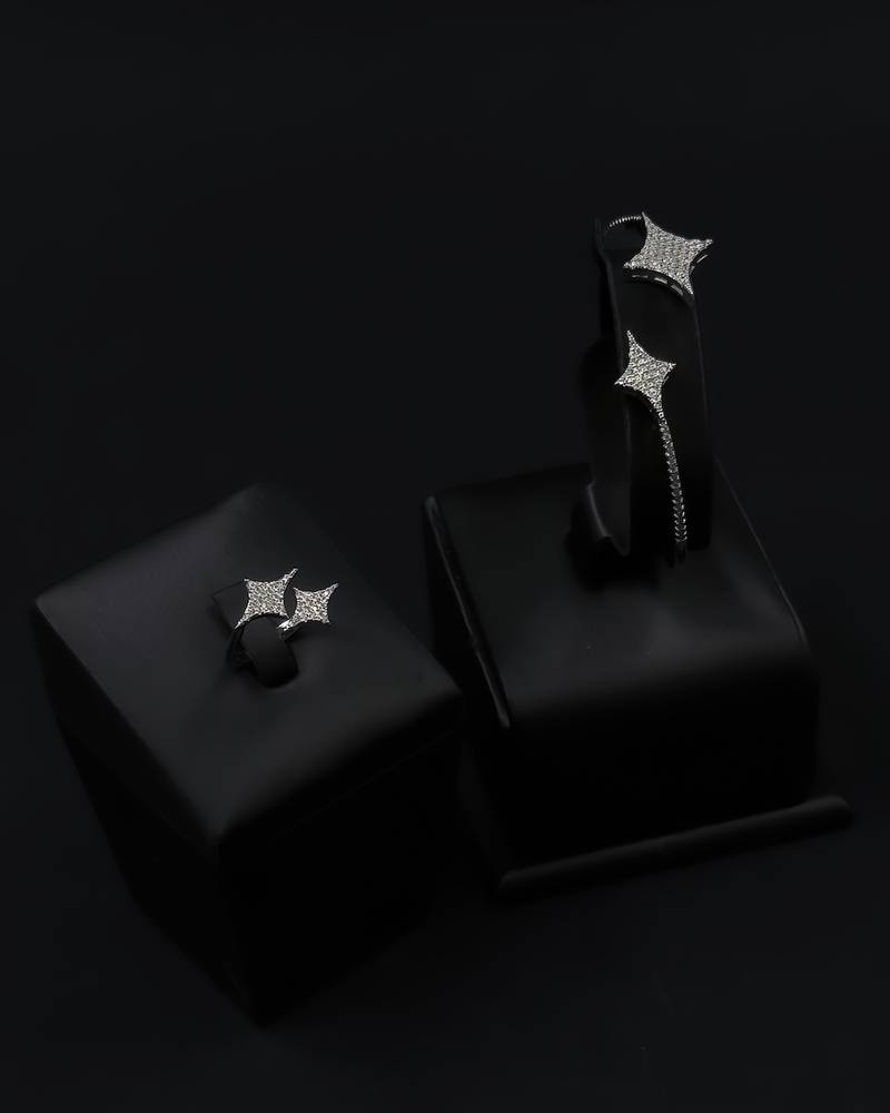 Bracelet and ring with a star design, studded with crystals