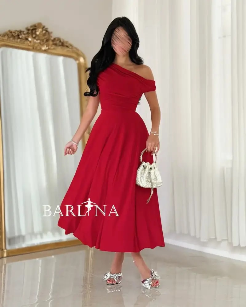 A soft and elegant red midi dress