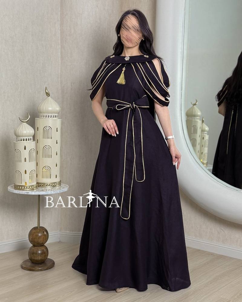 Dark purple jalabiya with gold details