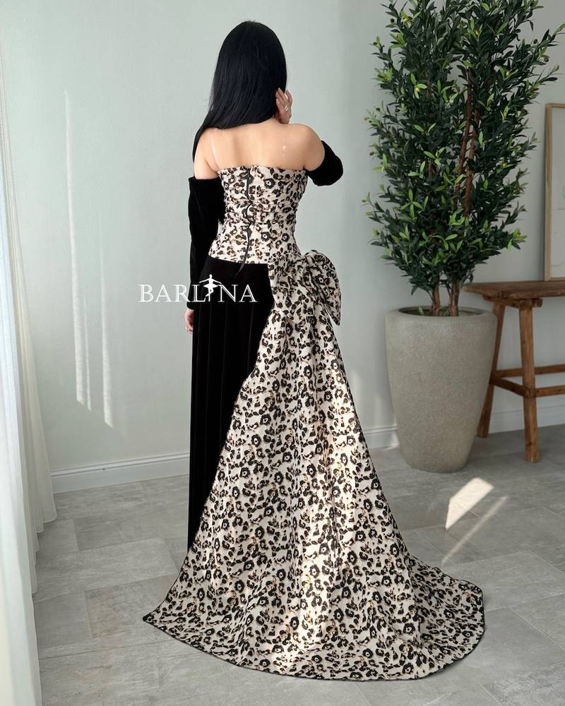 Black velvet dress with jacquard fabric embellishment