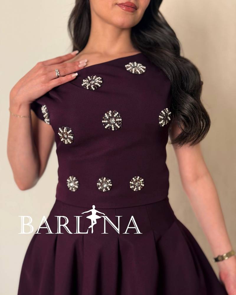 Dark purple dress with crystal embellishments