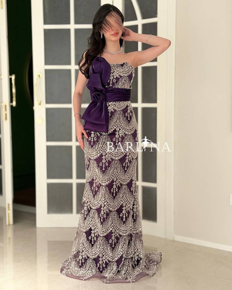 Purple evening dress embroidered with beads and sequins