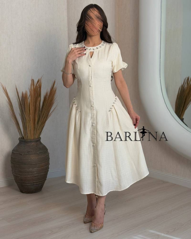 Soft off-white dress with front buttons