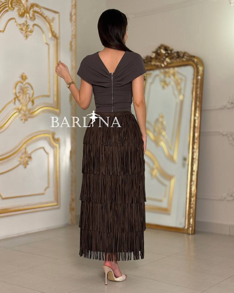 Set with a skirt decorated with soft fringe