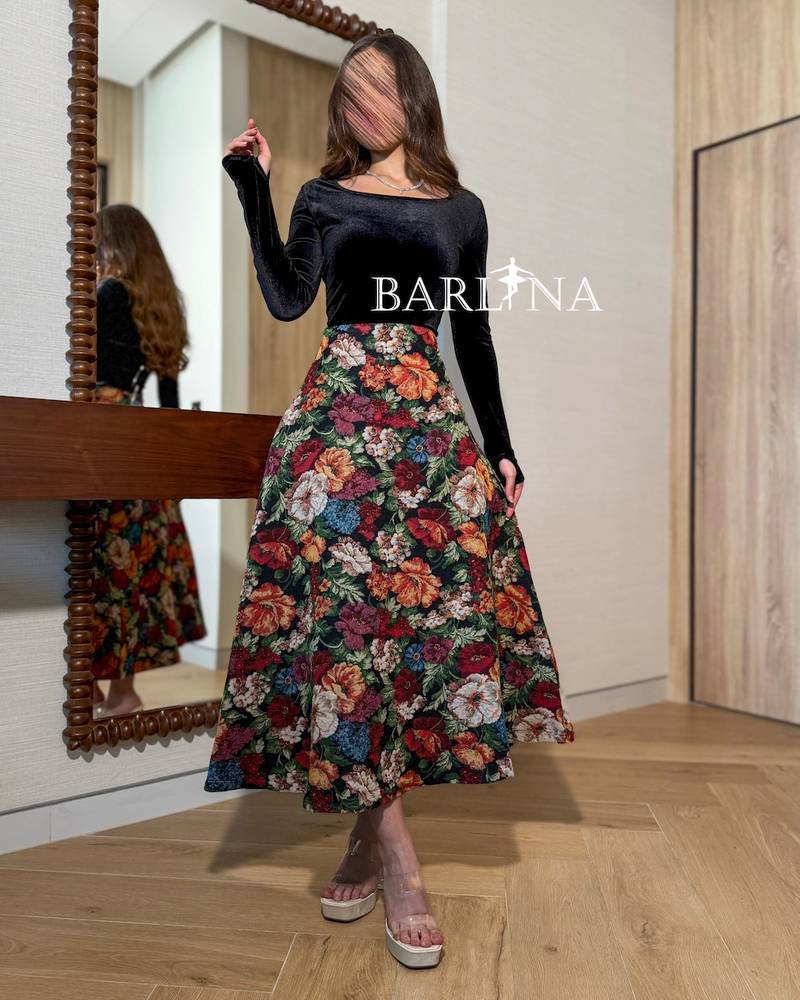 A velvet blouse with a floral skirt