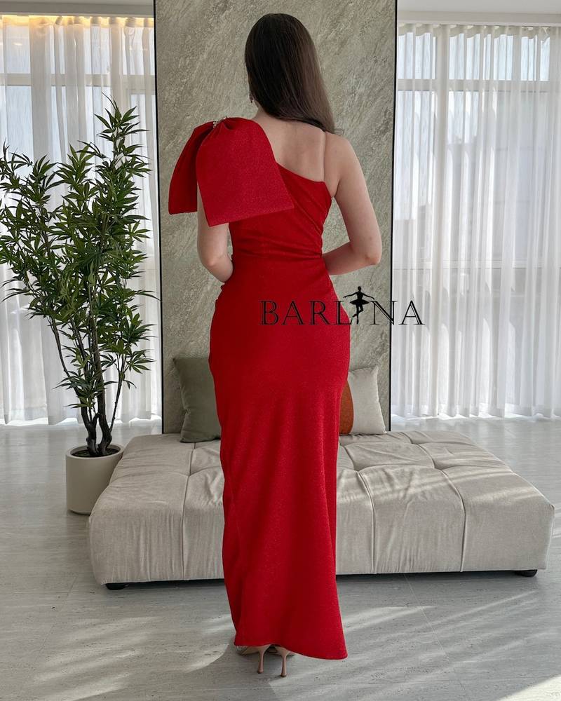 Red one shoulder dress with big bow