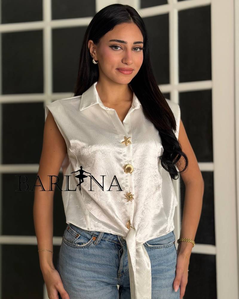 Elegant sleeveless blouse in a shiny color
