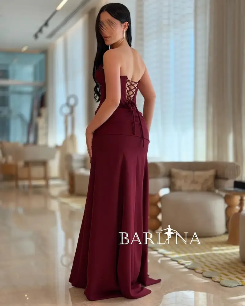 Burgundy dress with a corset design and wide cut