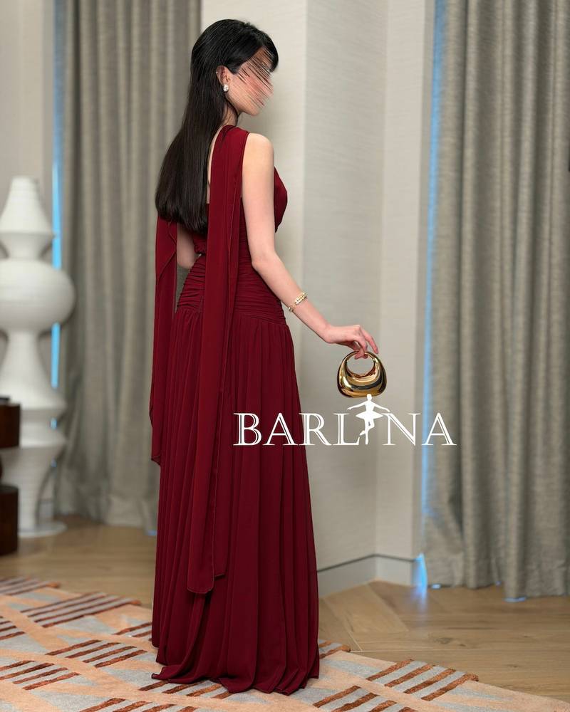 Burgundy dress with soft pleats and halter neck design