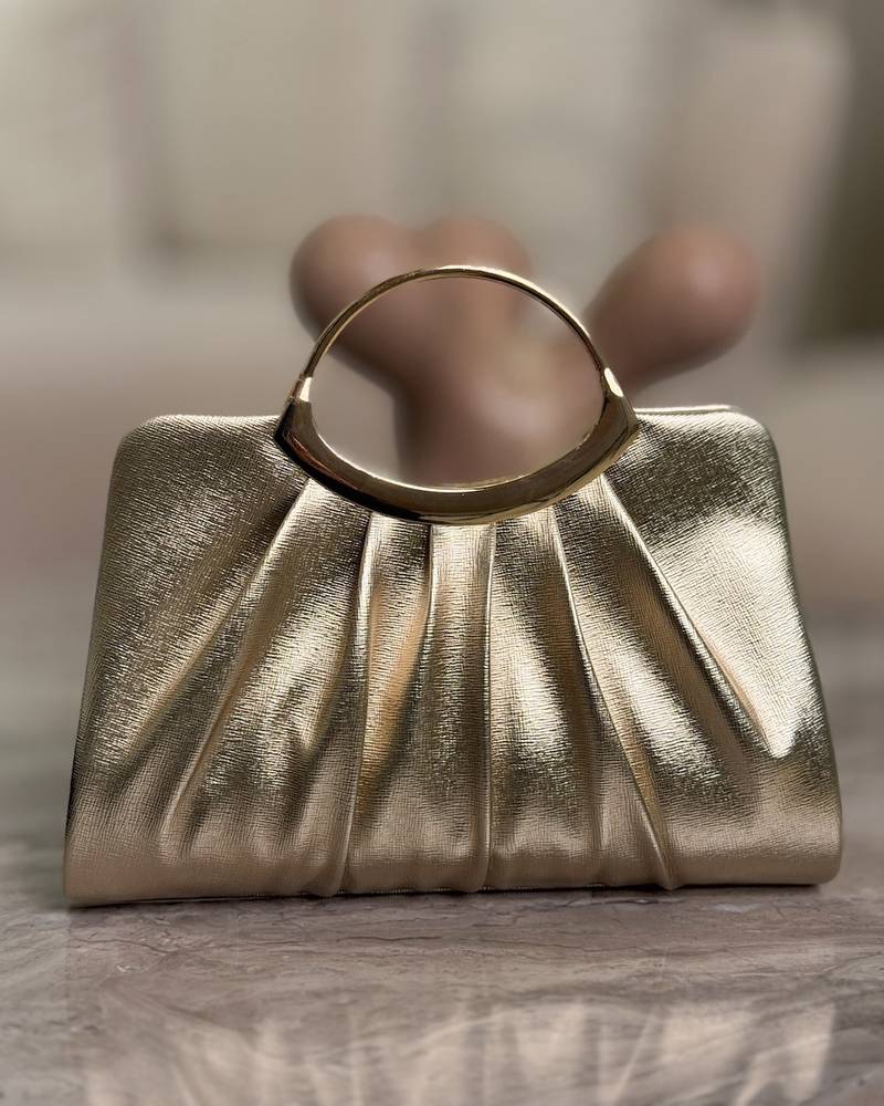 Evening bag with a soft design and elegant pleats