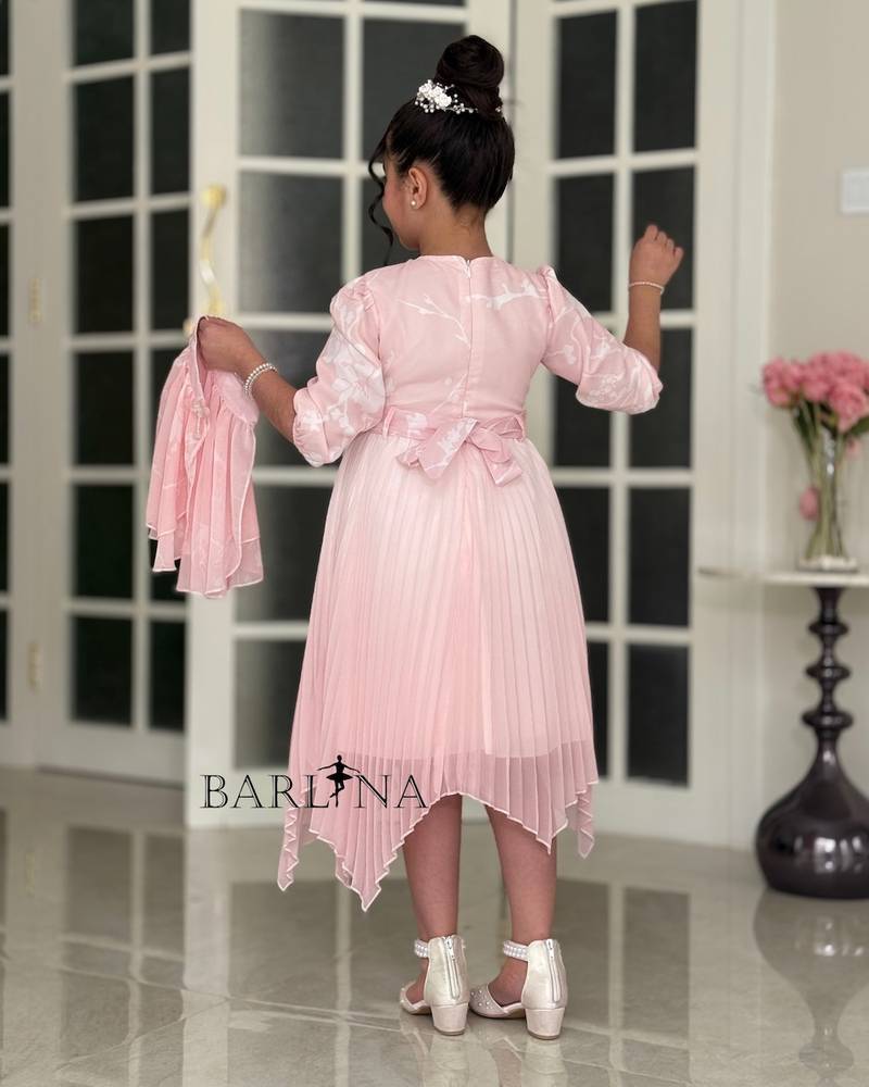 Girls' pleated dress with a floral overlay