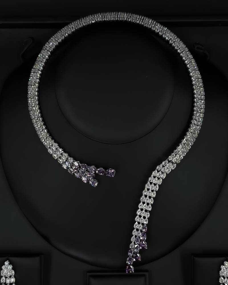 Modern accessory set with an open purple necklace