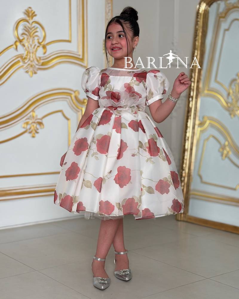 White girl's dress with red floral prints