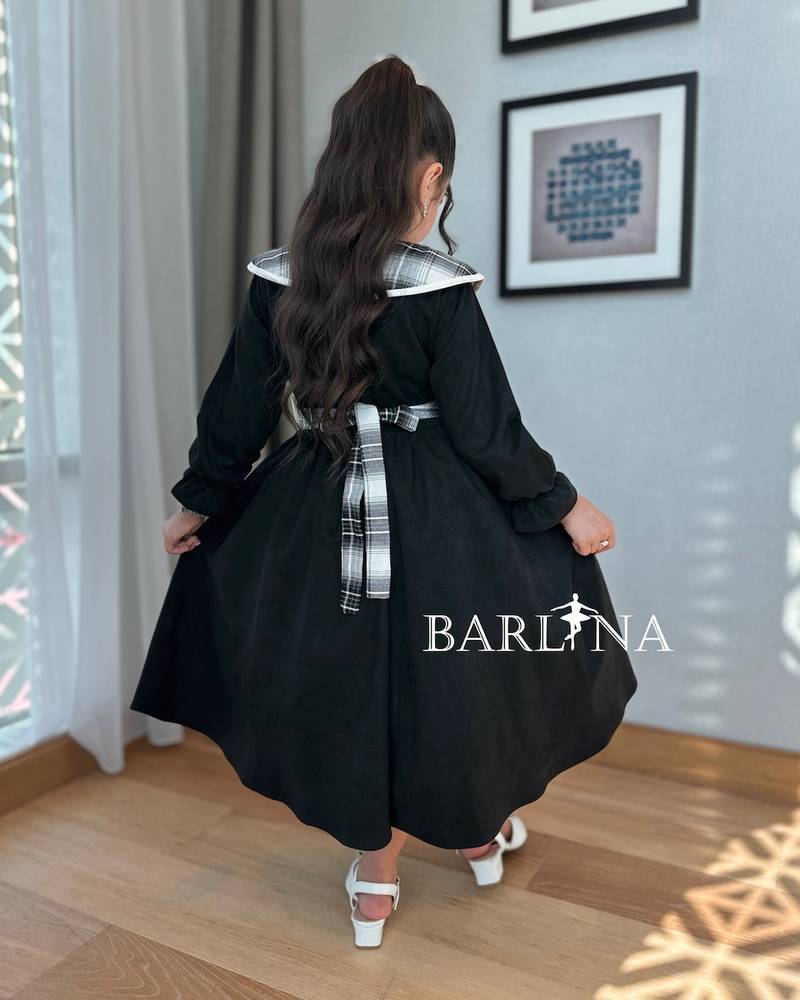 Girls' black dress with a checkered collar