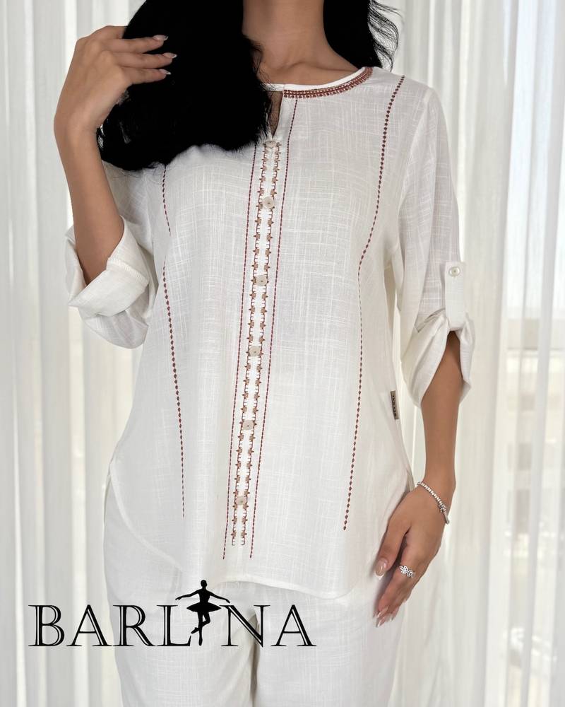 Soft white set embroidered with brown threads