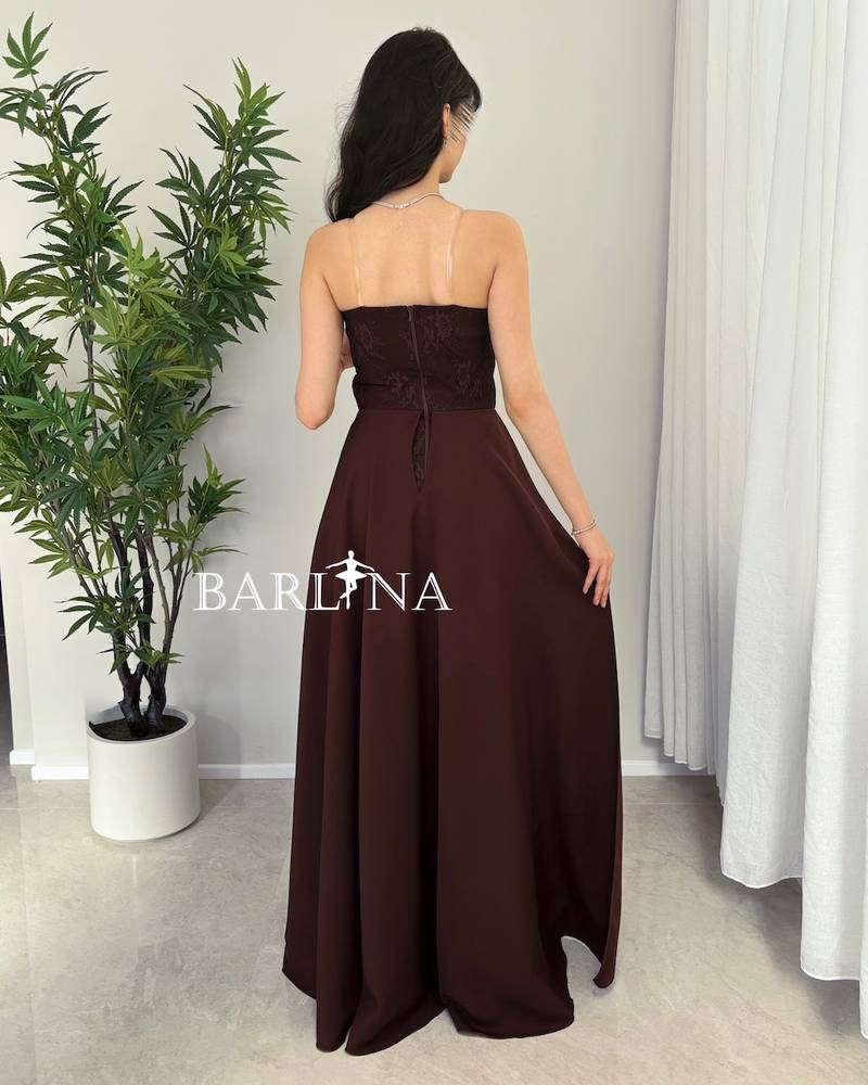 Brown dress with an open neckline and lace details