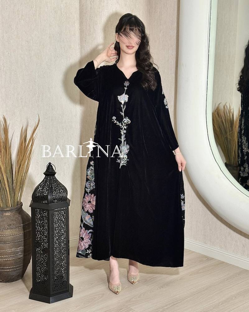 Black velvet jalabiya with delicate floral embroidery