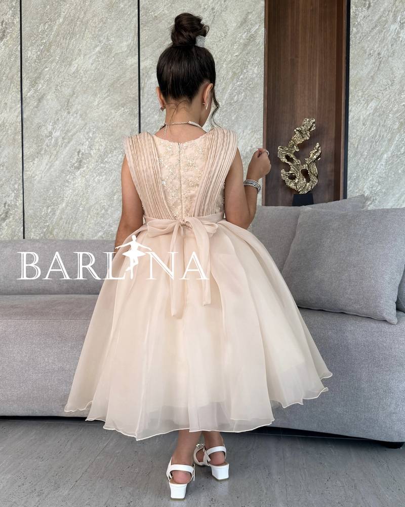 Girls' dark beige dress with a fluffy design