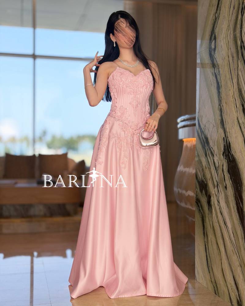 Pink evening set with embroidered corset design