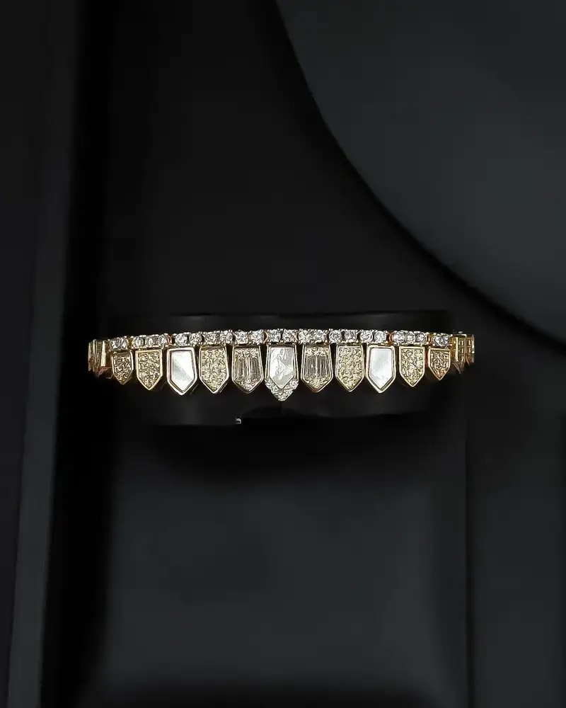 Unique gold accessory set with a geometric design