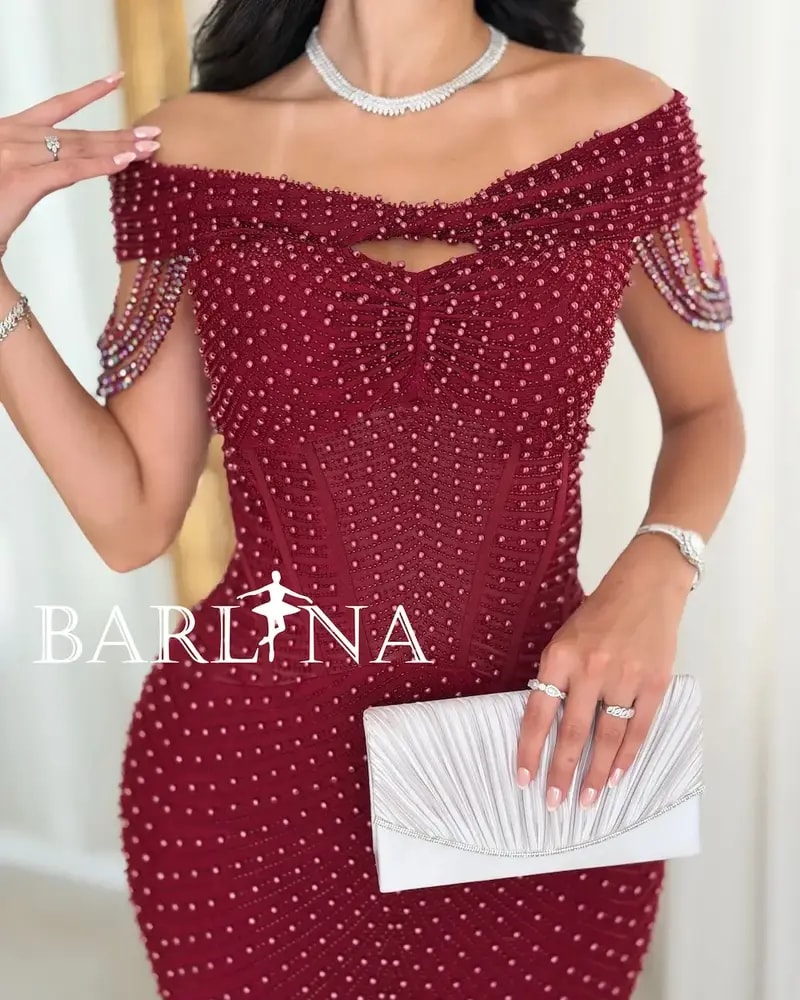 Burgundy evening dress fully embellished with pearls