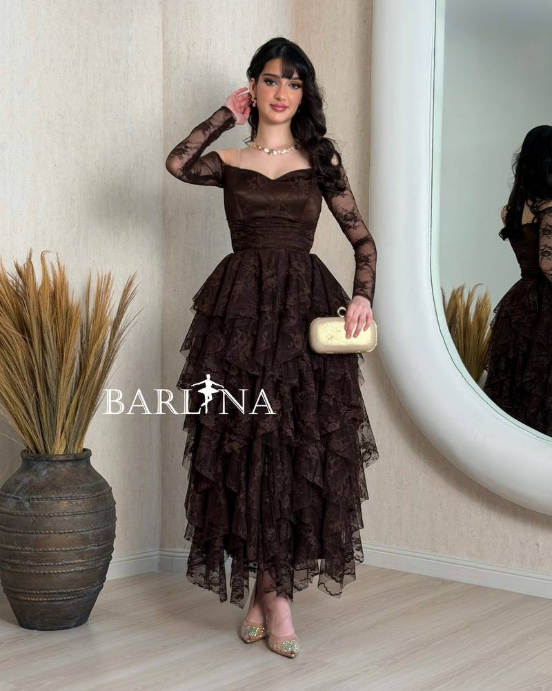 Brown lace dress with tiered ruffle layers
