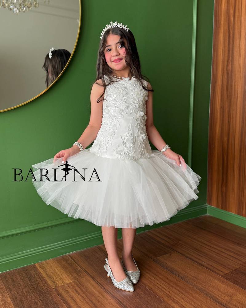 White girl's dress with elegant embroidery