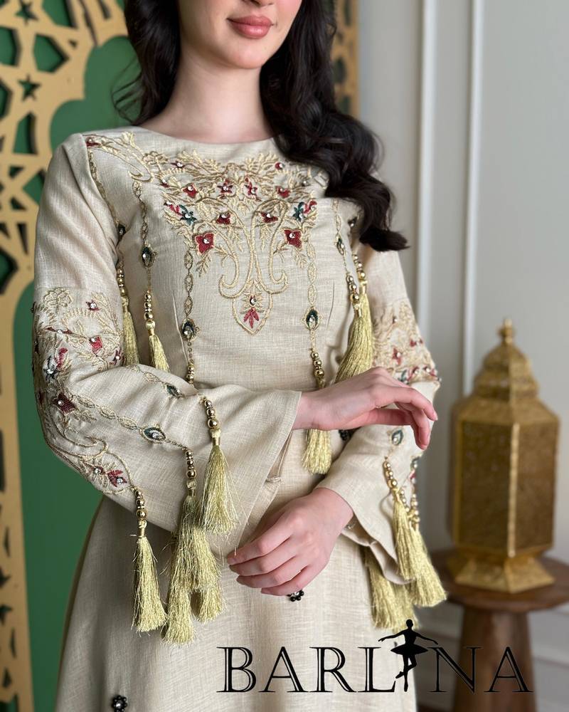 Beige jalabiya embroidered with delicate, fine details