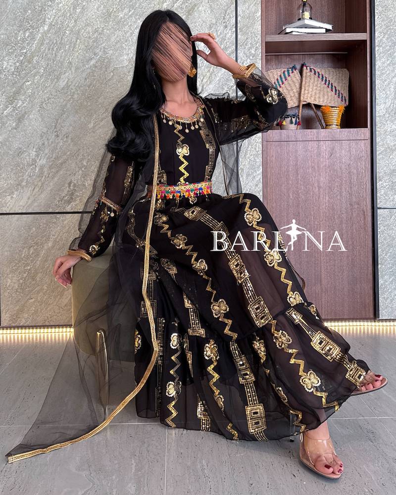 Black jalabiya with gold embroidery and transparent abaya