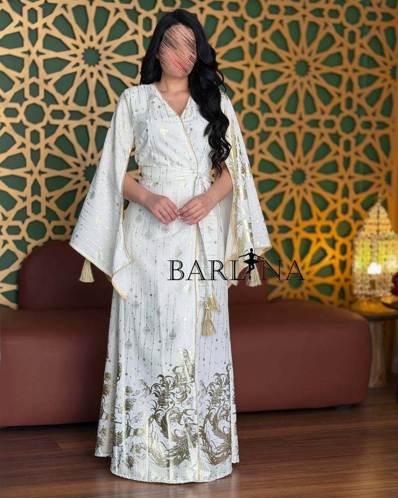 White jalabiya with gold prints and a side tie