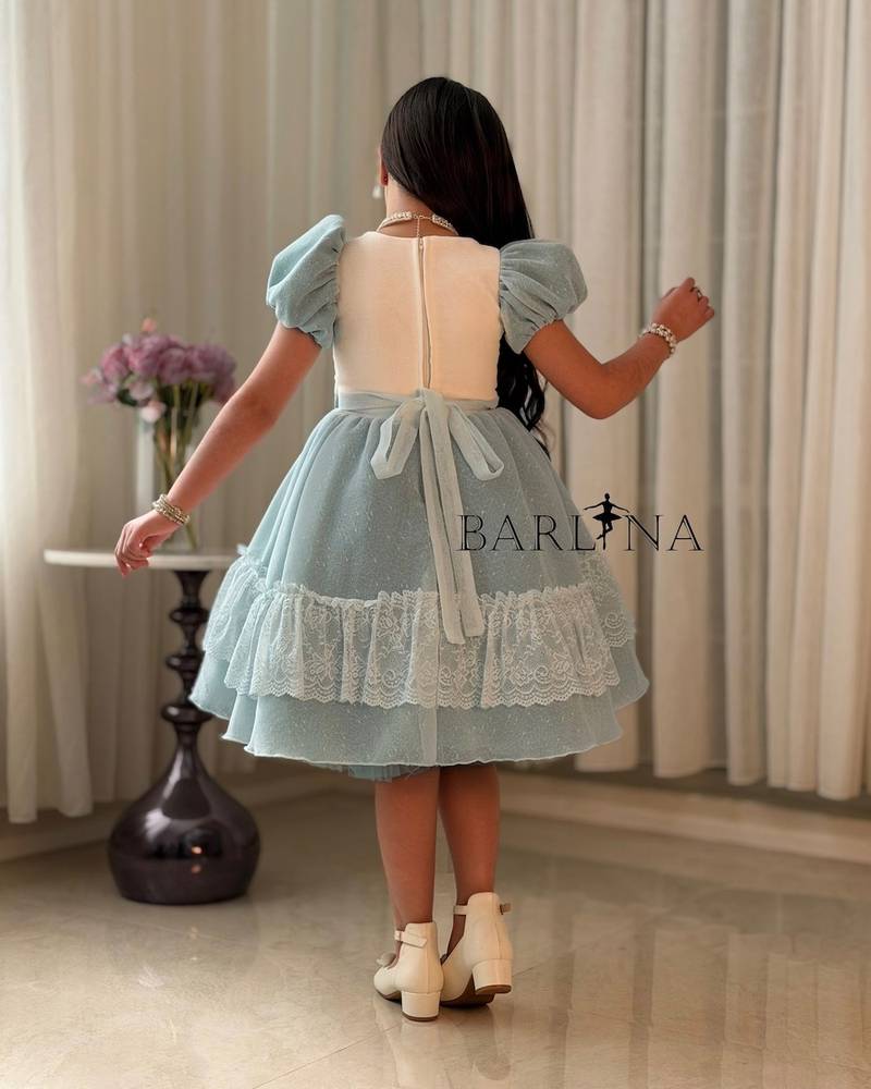Elegant Tiffany-style girls' dress with a lace trim