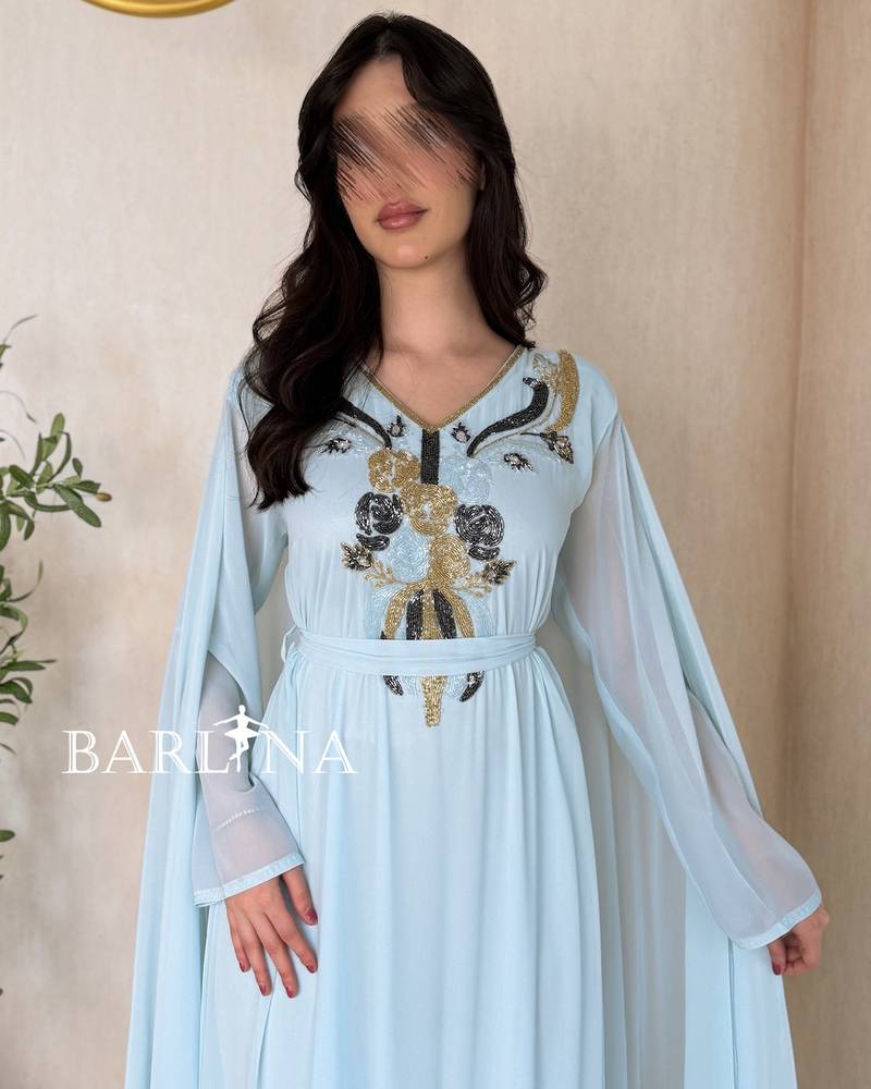 Sky blue jalabiya with a collar decorated with beadwork
