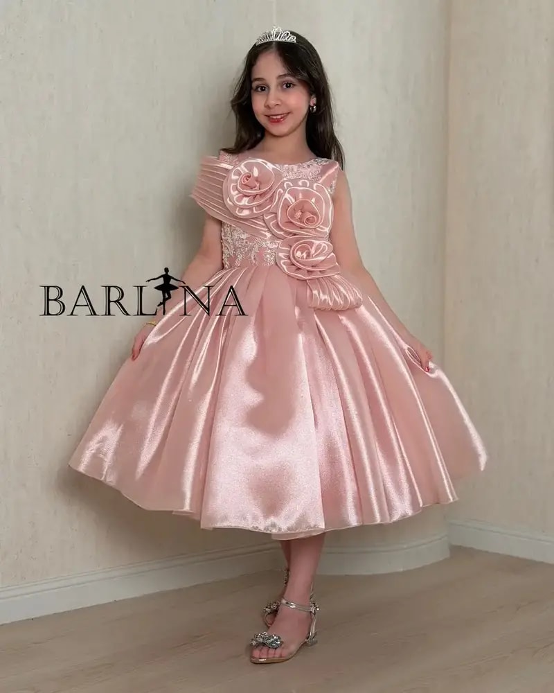 Girls' pink shiny dress with large roses