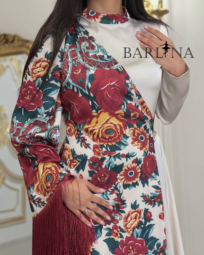 Long cream-colored jalabiya with a floral side scarf