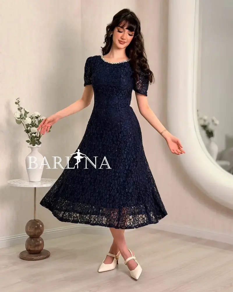 Navy blue dress with crystal embroidered neckline