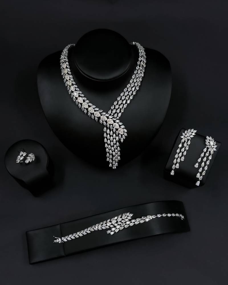 Crystal-studded accessory set with a dangling design