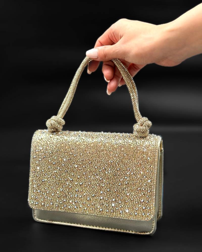 Evening handbag with a knotted top handle