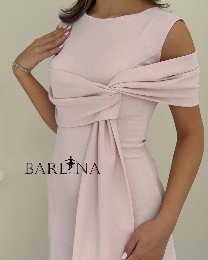 Pink dress with a wide bow at the chest