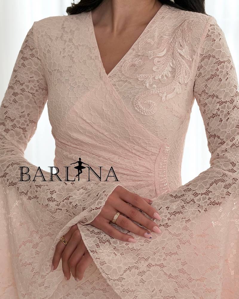 Pink lace midi dress with a feminine cut