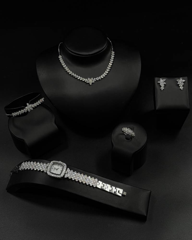 Elegant rose-themed accessory set with a watch