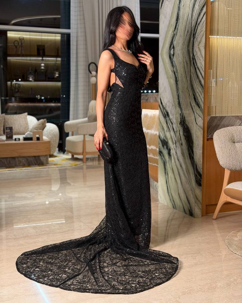 Black lace evening dress with a royal train